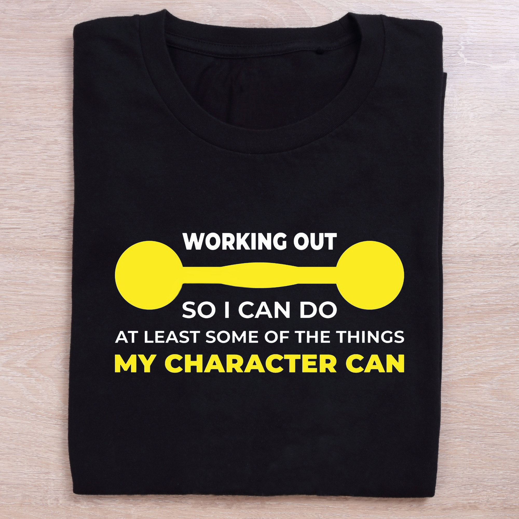 folded black gym t shirt working out