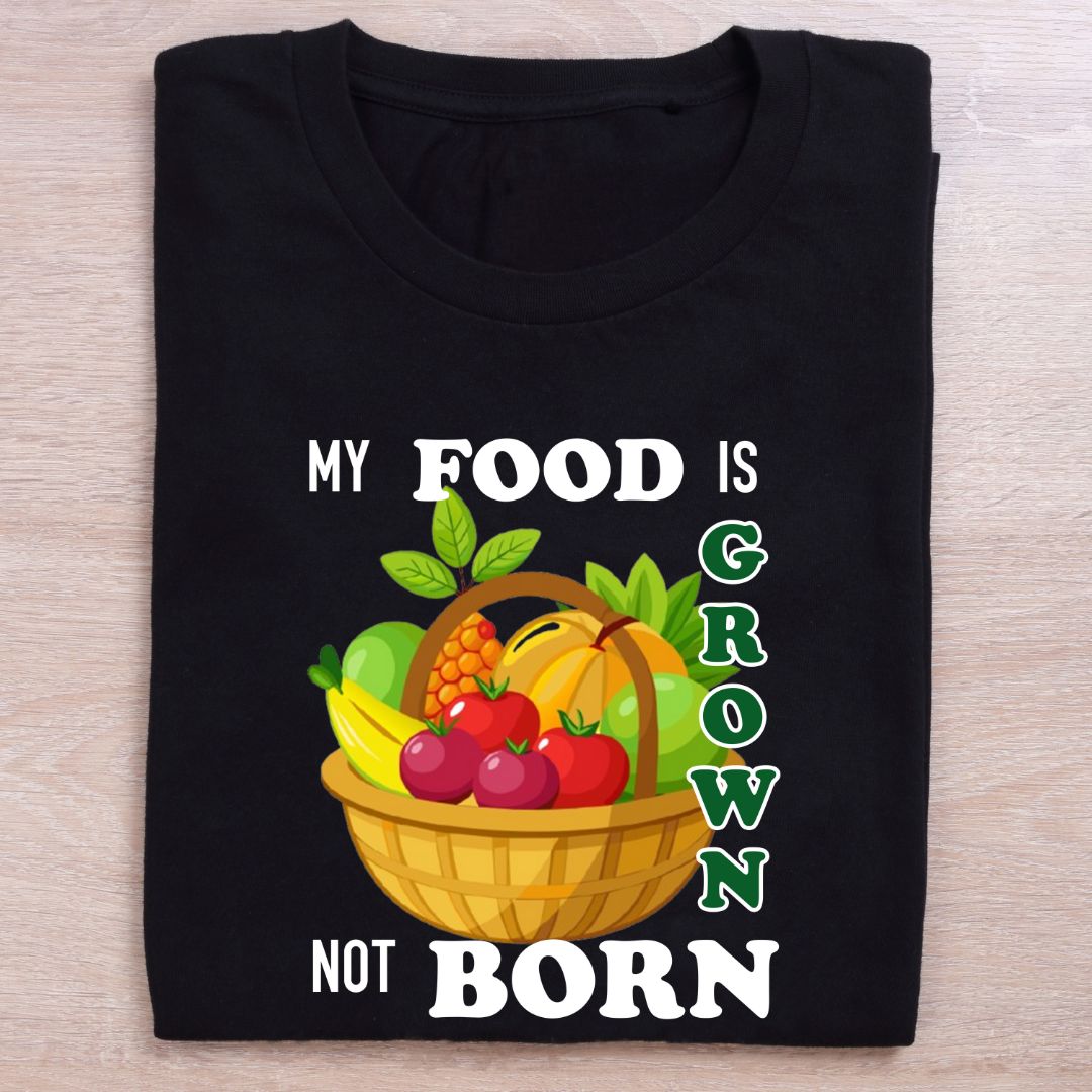 folded black vegan t shirt my food is grown not born