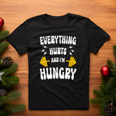 open lay black gym t shirt everything hurts am hungry