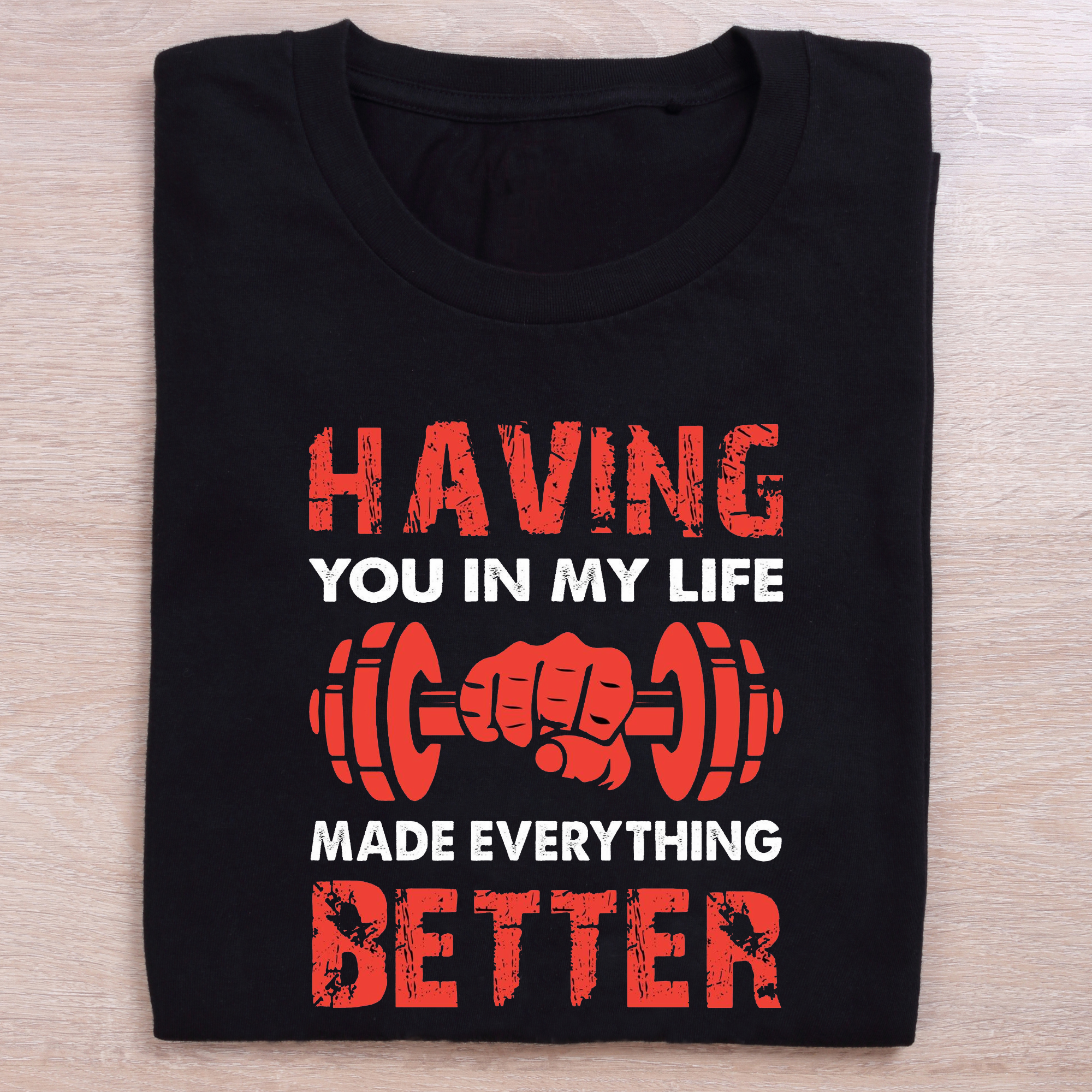 folded black gym t shirt everything better