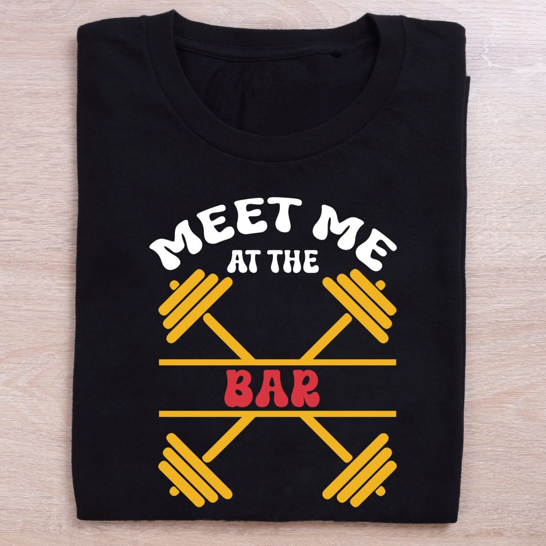 folded black gym t shirt meet me at the bar