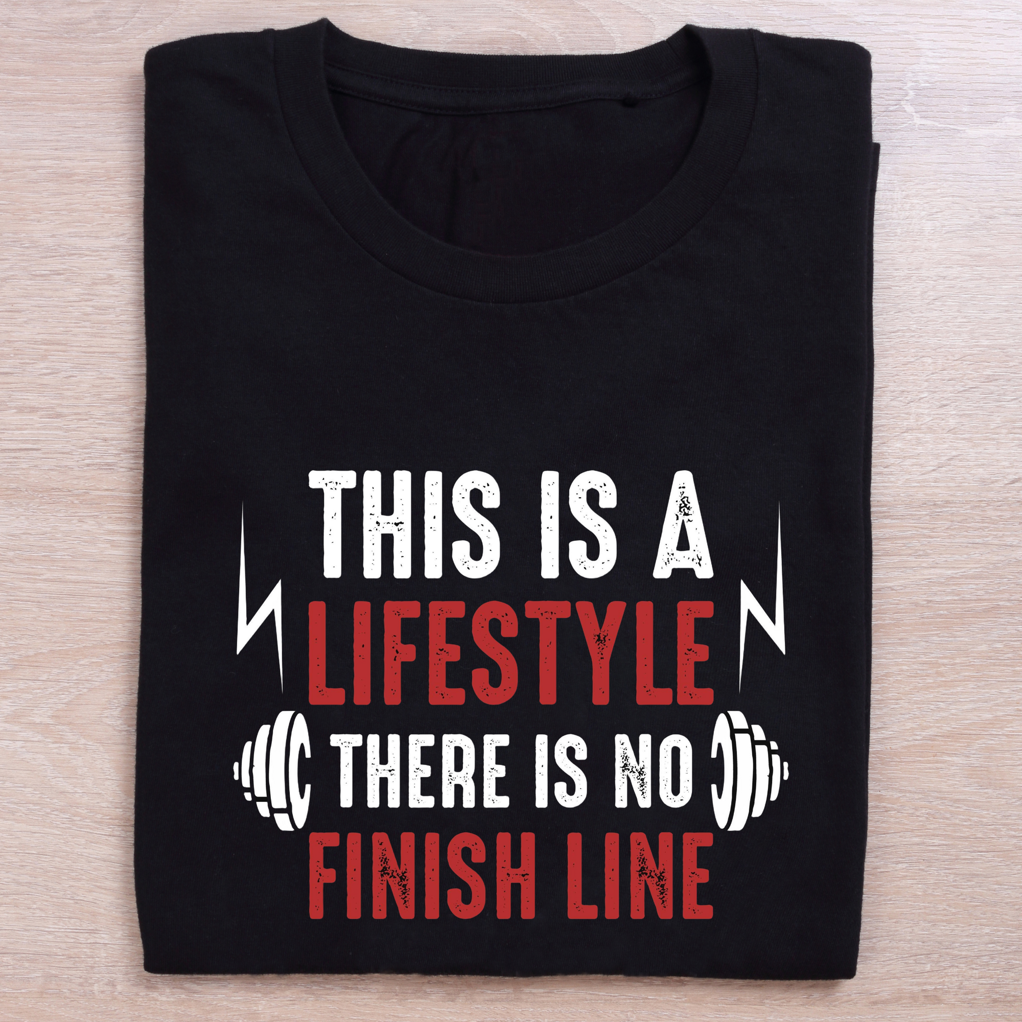 folded black gym t shirt there is no finish line