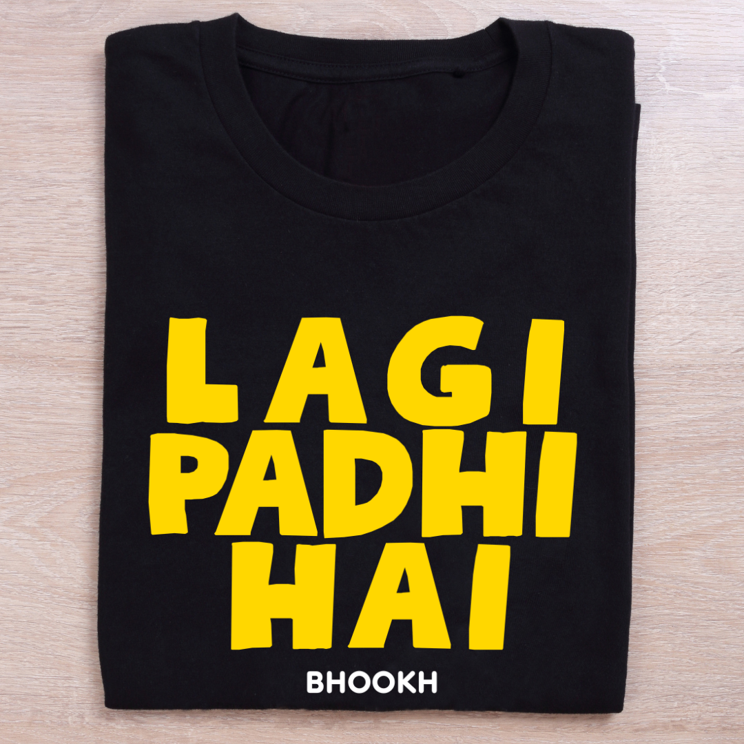folded black quirky t shirt lagi padhi hai bhookh